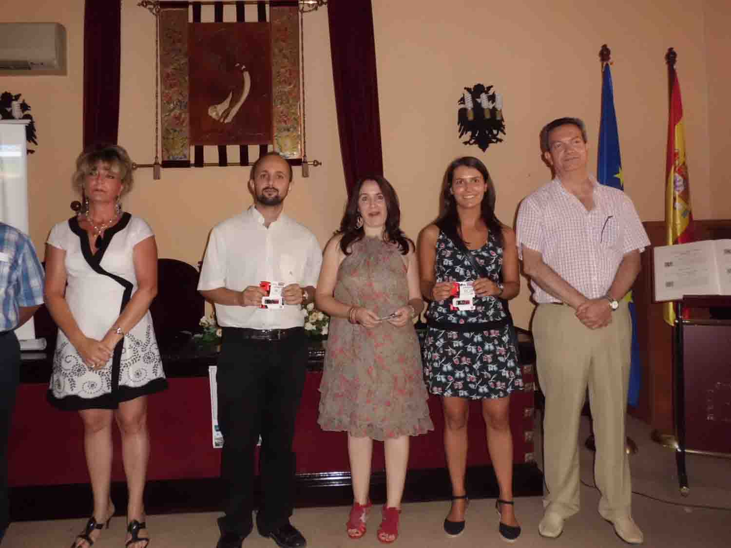 premio a la media entre proyecto y preguntas por equipo